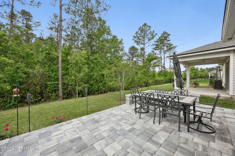 Exterior details and patio area of a home in Tributary, Yulee (Image 34).