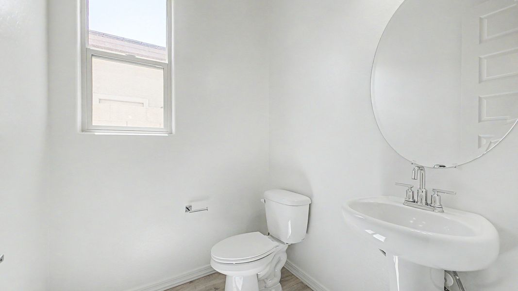 Representative furnished interior of a home built from the Montoro by DRB Homes in Windrose, Waddell (Image 8).