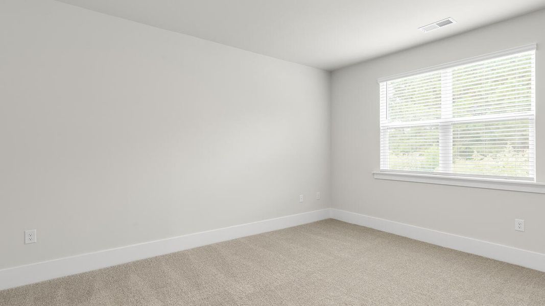 Spacious, unfurnished interior of a new home in The Haven at Indigo Preserve, Leland (Image 22).