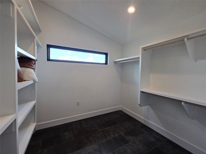 Primary closet is big enough to be its own room! Lots of storage options.