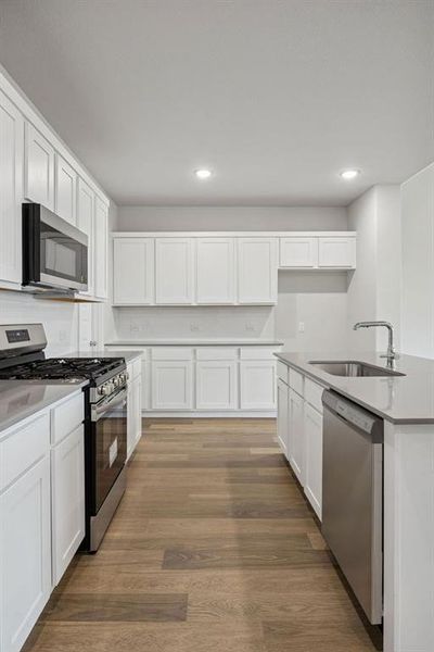 Kitchen in the Masters home plan by Trophy Signature Homes – REPRESENTATIVE PHOTO Kitchen in the Masters home plan by Trophy Signature Homes – REPRESENTATIVE PHOTO