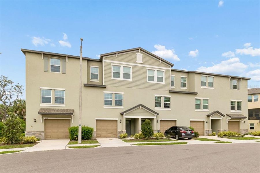 Front exterior of a new home in , Tampa, FL, highlighting curb appeal (Image 25). Front exterior of a new home in , Tampa, FL, highlighting curb appeal (Image 25).