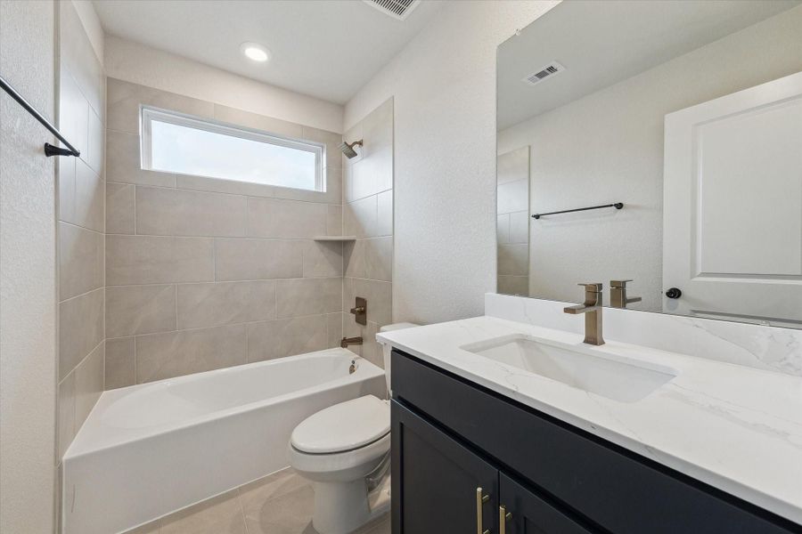Furnished interior view inside a new home in Elyson, Katy (Image 11).