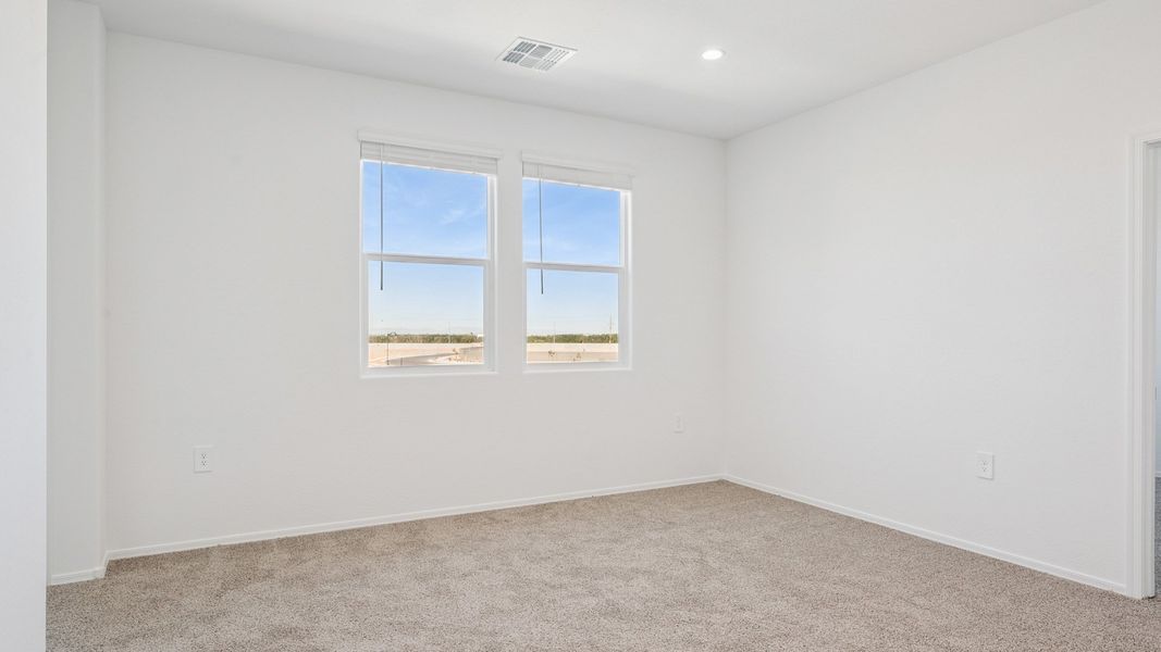 Spacious, unfurnished interior of a new home in Elena Trails, Maricopa (Image 25).