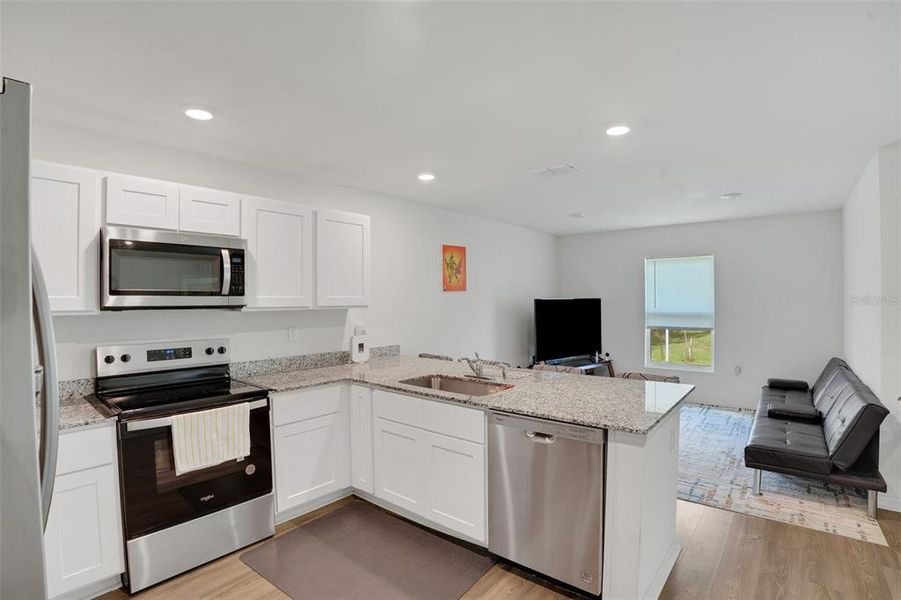 Furnished interior view inside a new home in , Punta Gorda (Image 9). Furnished interior view inside a new home in , Punta Gorda (Image 9).