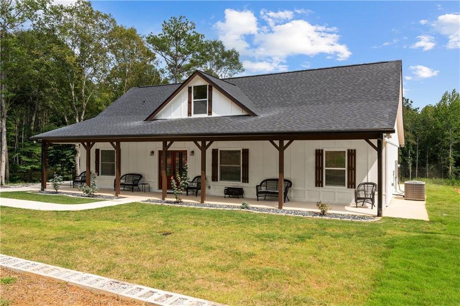 Front exterior of a new home in , Carrollton, GA, highlighting curb appeal (Image 2).