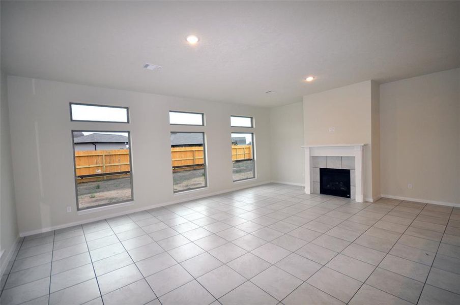 Family Room with Remotely controlled directly vented gas fireplace