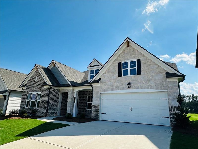 Front exterior of a new home in Summerlin, Winder, GA, highlighting curb appeal (Image 27).