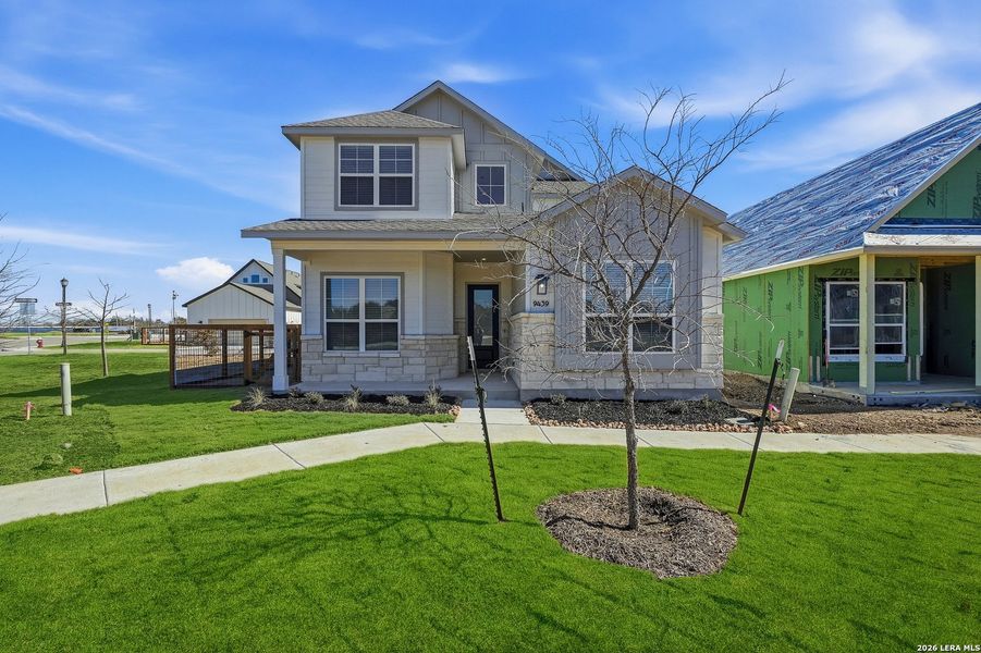 Front exterior of a new home in The Crossvine, Schertz, TX, highlighting curb appeal (Image 23).