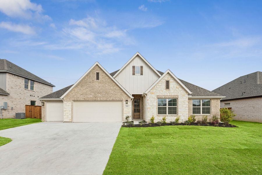 Front exterior of a new home in Dove Hollow, Waxahachie, TX, highlighting curb appeal (Image 1). Front exterior of a new home in Dove Hollow, Waxahachie, TX, highlighting curb appeal (Image 1).