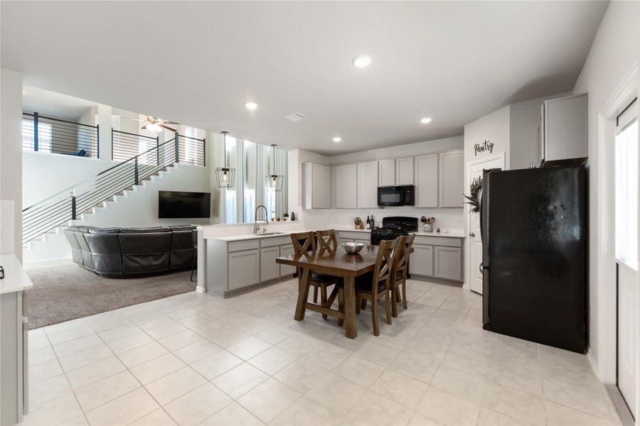 The heart of the home — a chef-inspired kitchen featuring 42” upper cabinets, extra storage, granite countertops, and an upgraded sink and faucet that elevate the everyday. The heart of the home — a chef-inspired kitchen featuring 42” upper cabinets, extra storage, granite countertops, and an upgraded sink and faucet that elevate the everyday.