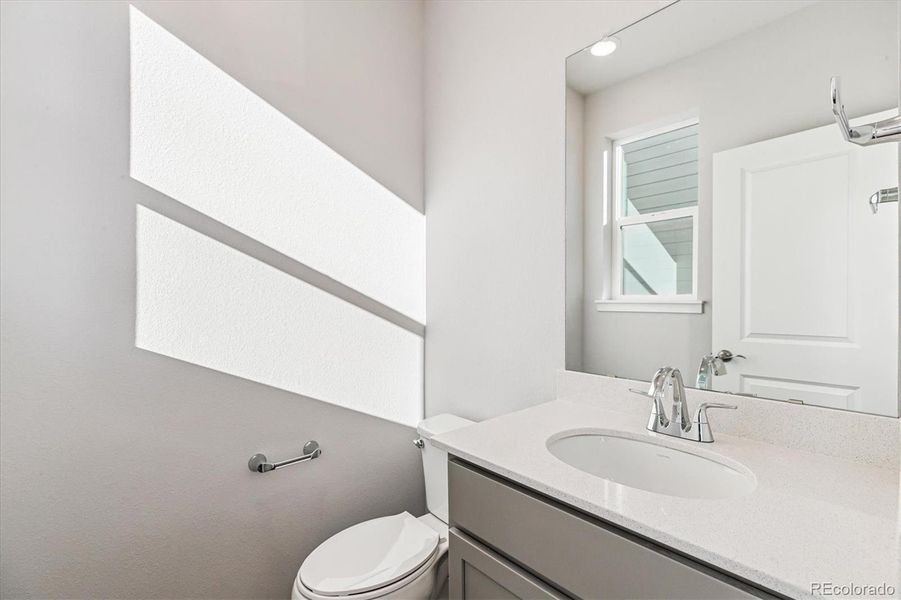 Furnished interior view inside a new home in Floret Collection at Alder Creek, Parker (Image 4).