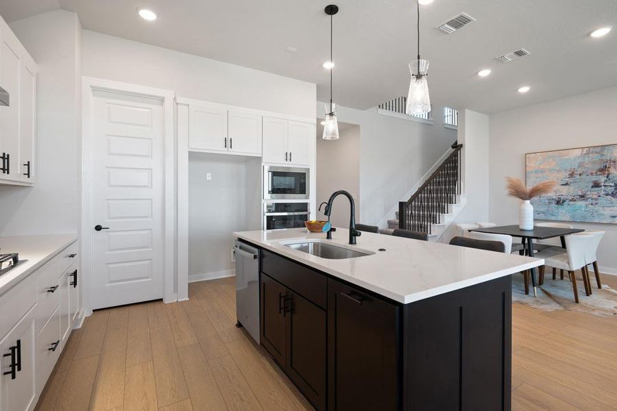 Furnished interior view inside a new home in Park Collection at Lariat, Liberty Hill (Image 6). Furnished interior view inside a new home in Park Collection at Lariat, Liberty Hill (Image 6).