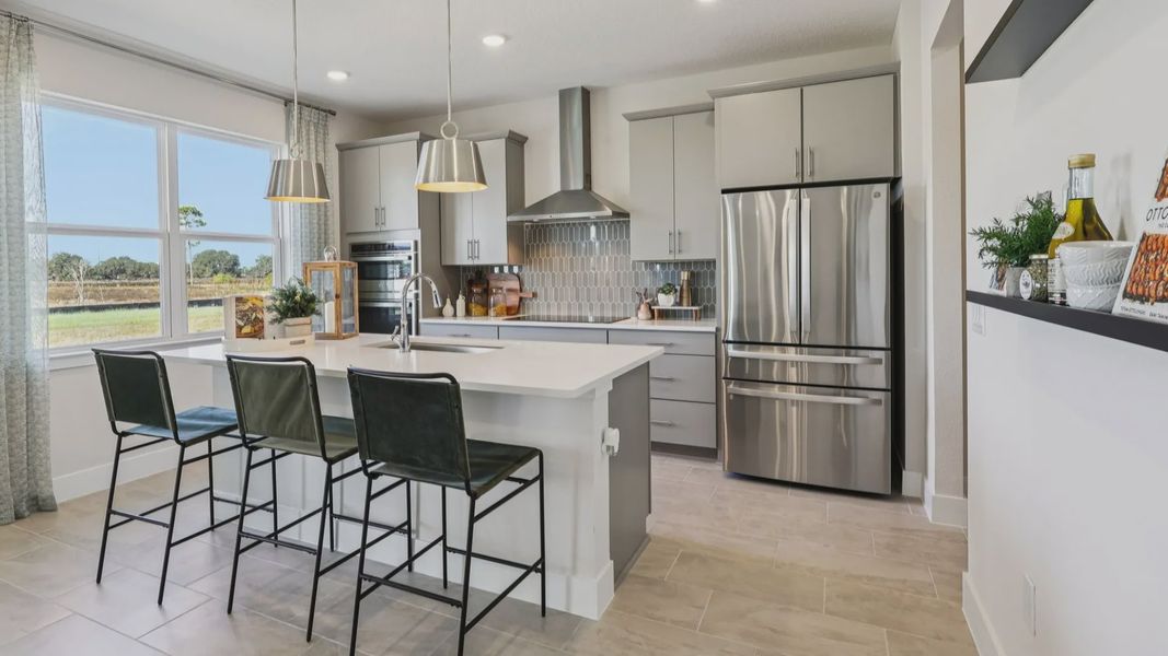The Mangrove Kitchen at Lakeside at Satilla by DRB Homes in Saint Cloud, FL The Mangrove Kitchen at Lakeside at Satilla by DRB Homes in Saint Cloud, FL