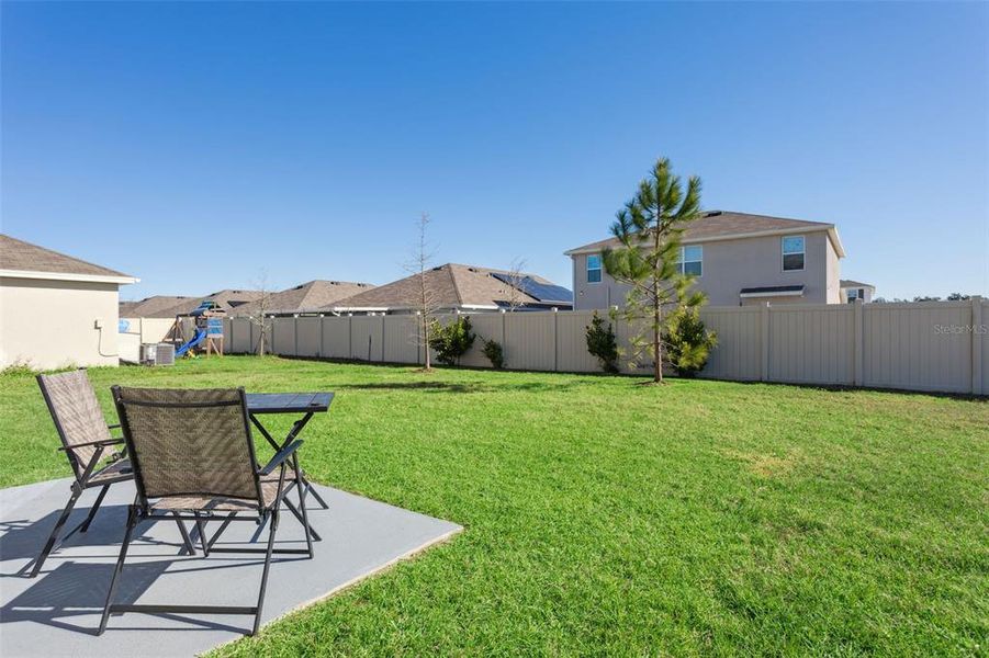 Exterior details and patio area of a home in Zephyr Ridge, Zephyrhills (Image 4). Exterior details and patio area of a home in Zephyr Ridge, Zephyrhills (Image 4).