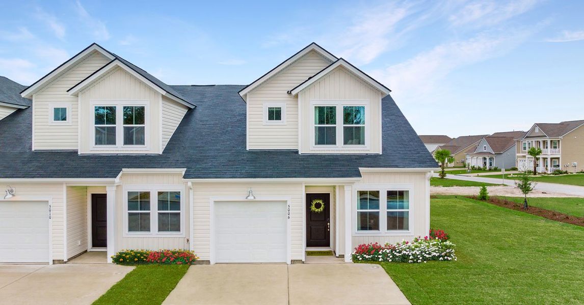Front exterior of a home in the Collins Walk Townhomes community, located in Conway, SC (Image 10).