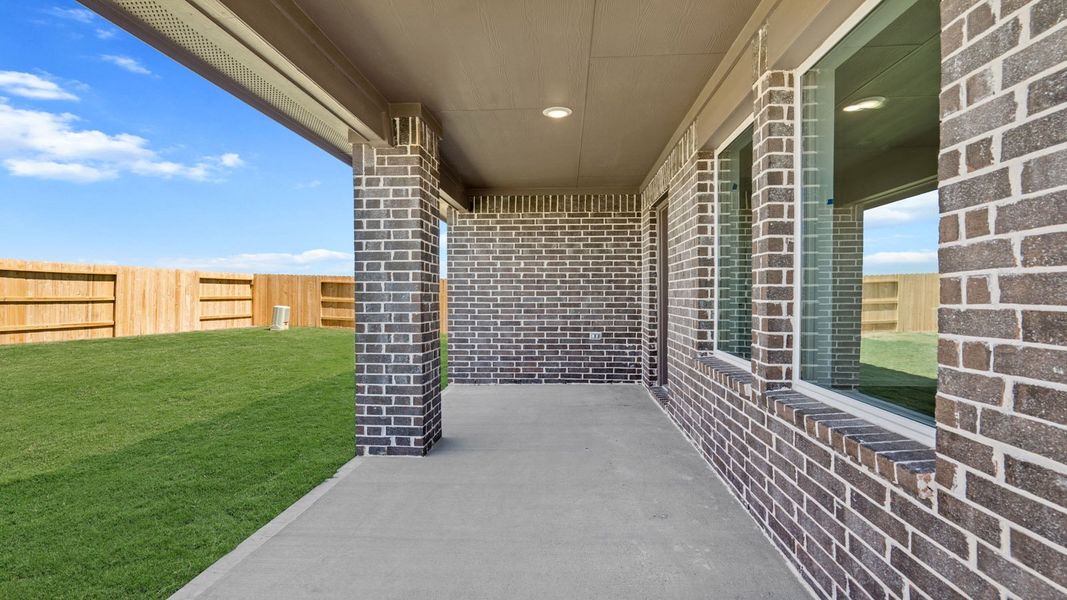 Exterior details and patio area of a home in Sunterra Lakes, Brookshire (Image 3). Exterior details and patio area of a home in Sunterra Lakes, Brookshire (Image 3).