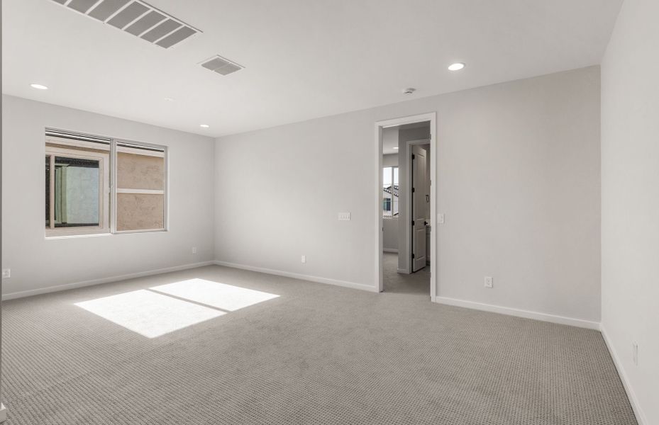 Spacious, unfurnished interior of a new home in Legado West, Queen Creek (Image 31).