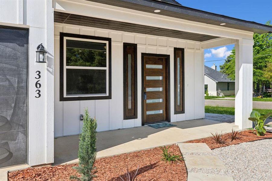 Front porch perfect for enjoying an evening outside Front porch perfect for enjoying an evening outside