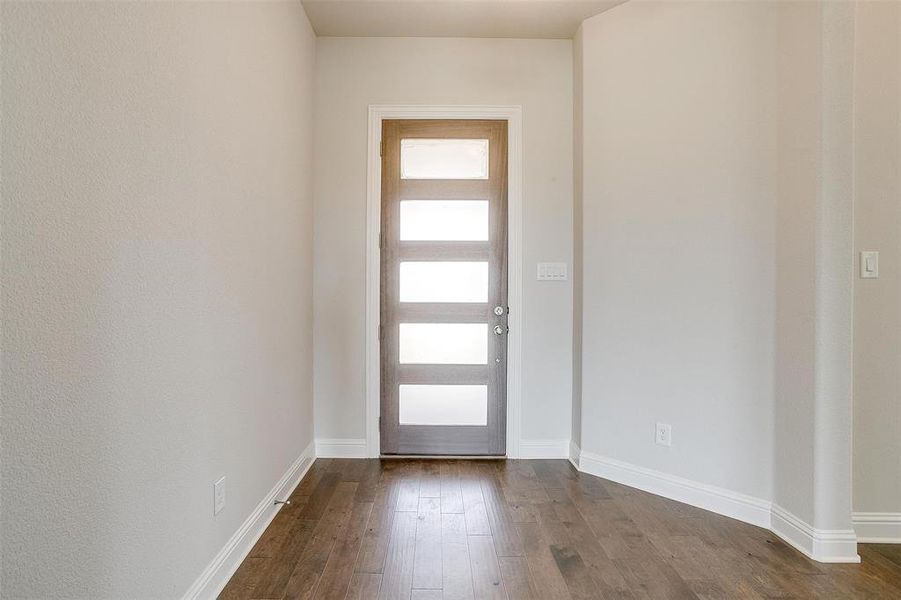 Entryway featuring hardwood / wood-style flooring