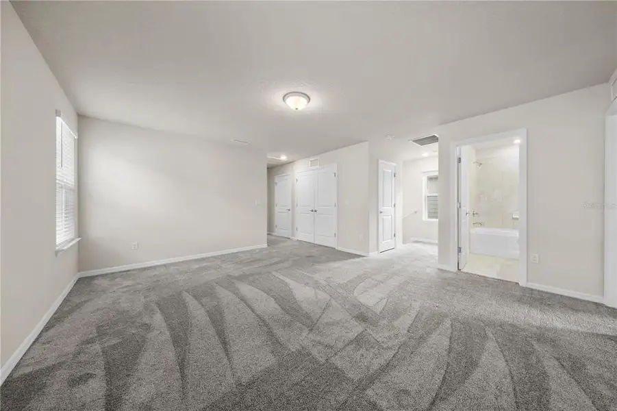 Spacious, unfurnished interior of a new home in EverBe, Orlando (Image 28).