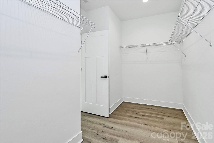 Main Floor Primary Bedroom Walk In Closet