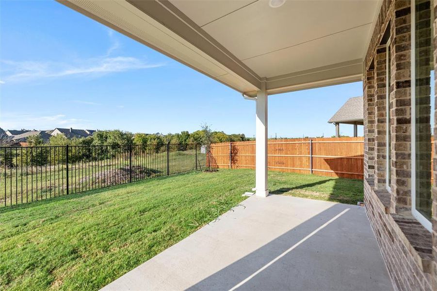 Exterior details and patio area of a home in Morningstar, Aledo (Image 2).