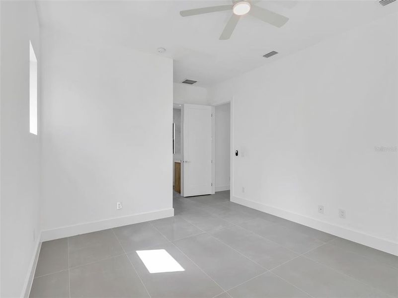 Spacious, unfurnished interior of a new home in , Port Charlotte (Image 25).
