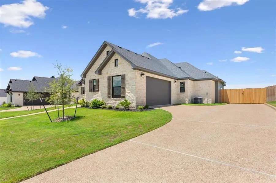 Front exterior of a new home in , Waco, TX, highlighting curb appeal (Image 2). Front exterior of a new home in , Waco, TX, highlighting curb appeal (Image 2).