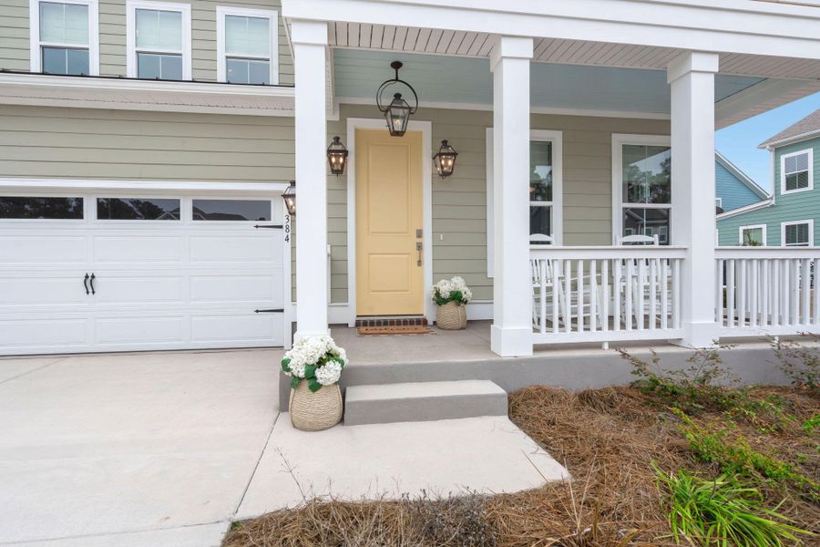 Exterior details and patio area of a home in Tidewater at Lakes of Cane Bay, Summerville (Image 25).