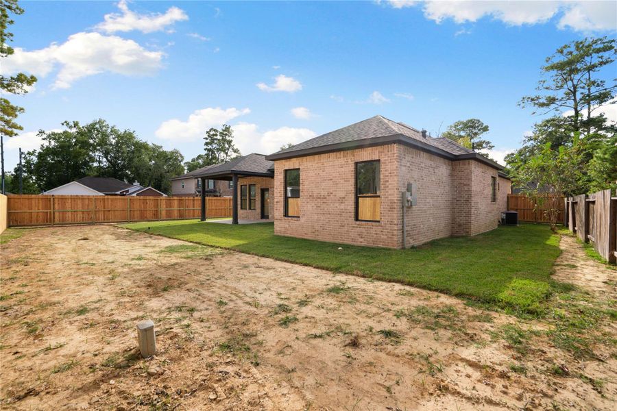 Exterior details and patio area of a home in , Crosby (Image 3).