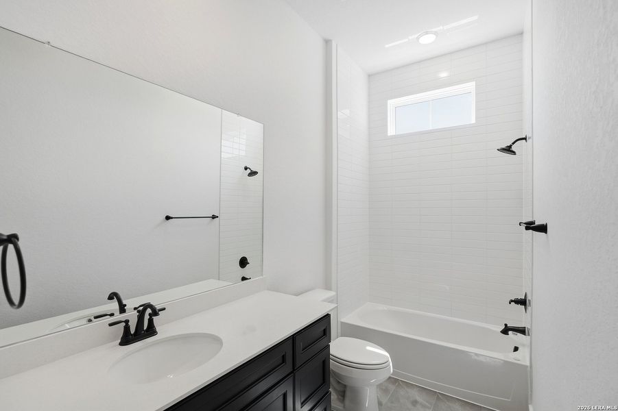 Furnished interior view inside a new home in Prominence Urban, San Antonio (Image 11).