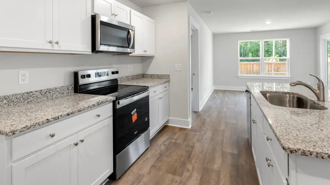 Furnished interior view inside a new home in Cedar Hill Landing, Navassa (Image 10).
