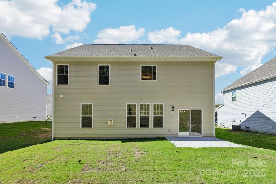 Exterior details and patio area of a home in Falls Cove, Troutman (Image 3).