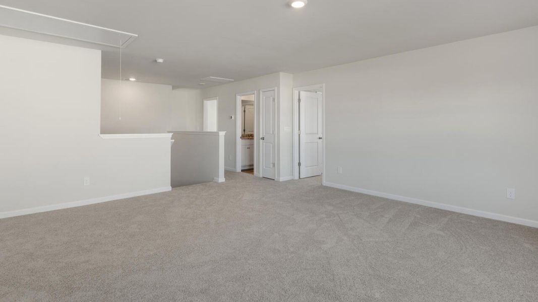 Representative unfurnished interior of a home built from the HARBOR OAK by D.R. Horton in Indigo Preserve, Leland (Image 35).