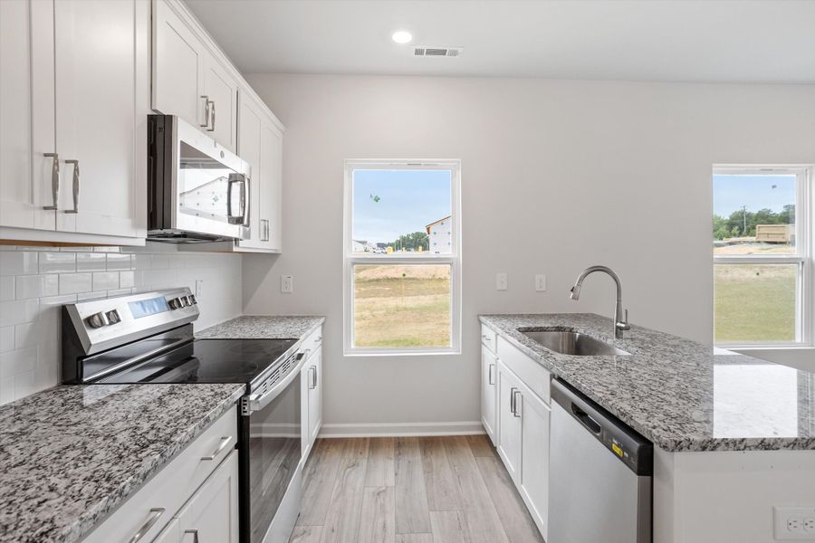 Furnished interior view inside a new home in Cambridge Reserve, Angier (Image 10).