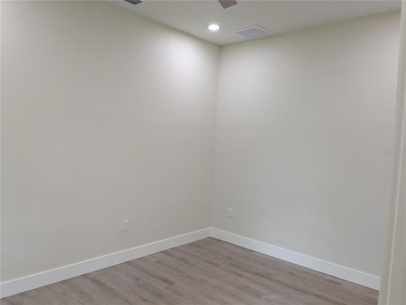 Spacious, unfurnished interior of a new home in , Port Charlotte (Image 57).