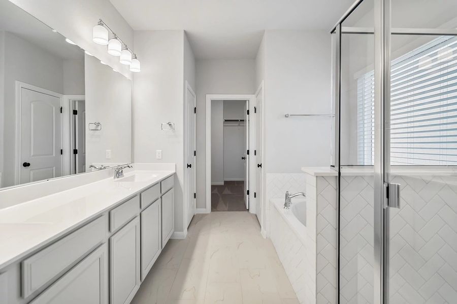 Representative furnished interior of a home built from the Granbury by Ashton Woods in The Trails at Carmel, Pflugerville (Image 17).