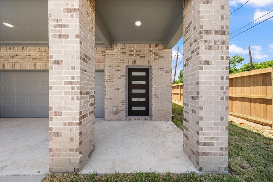 Exterior details and patio area of a home in , Houston (Image 3).