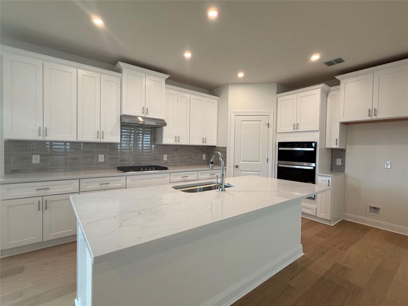 Furnished interior view inside a new home in Sage Hollow, Kyle (Image 5).