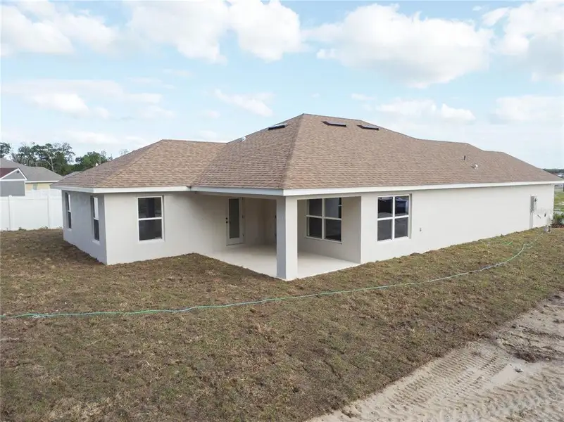 Exterior details and patio area of a home in , Ocala (Image 4).