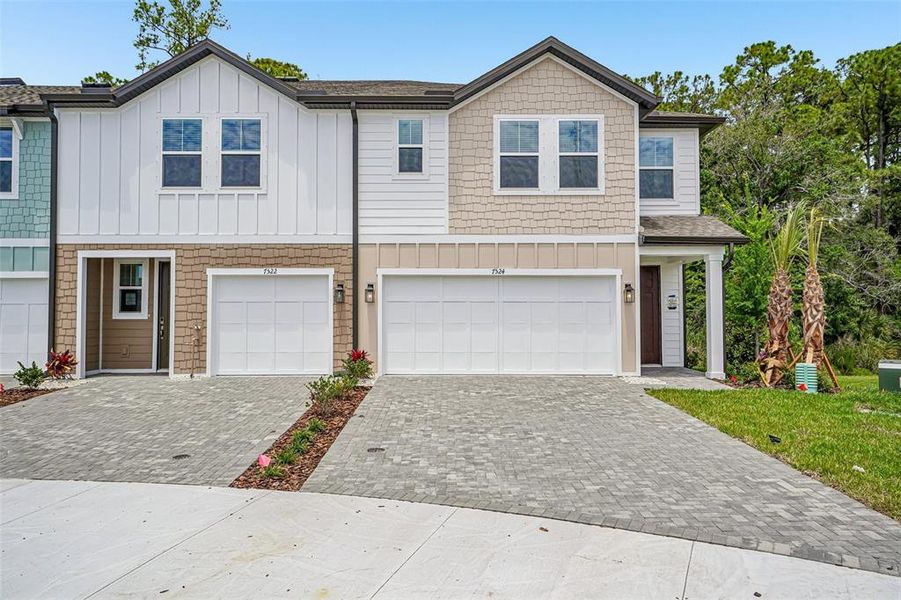 Front exterior of a new home in Montague Chase, Tampa, FL, highlighting curb appeal (Image 1). Front exterior of a new home in Montague Chase, Tampa, FL, highlighting curb appeal (Image 1).