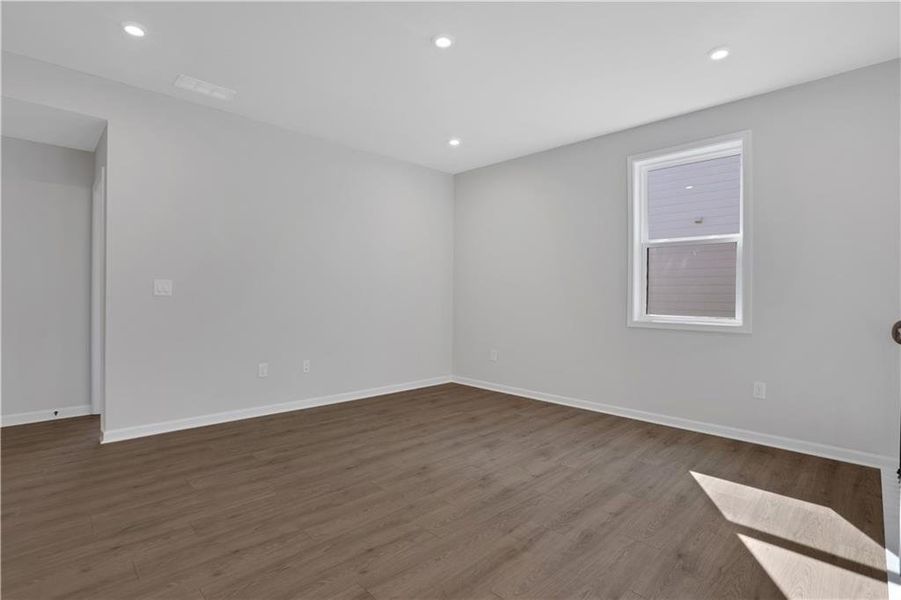 Spacious, unfurnished interior of a new home in The Paddocks at Doc Hughes, Buford (Image 39).