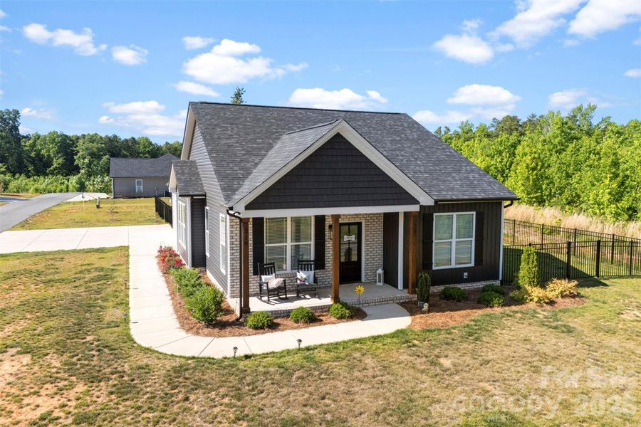 Front exterior of a new home in , Albemarle, NC, highlighting curb appeal (Image 21).