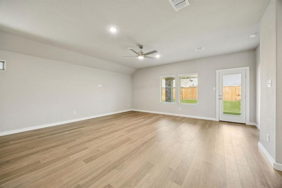 Living Room in the Oscar home plan by Trophy Signature Homes – REPRESENTATIVE PHOTO