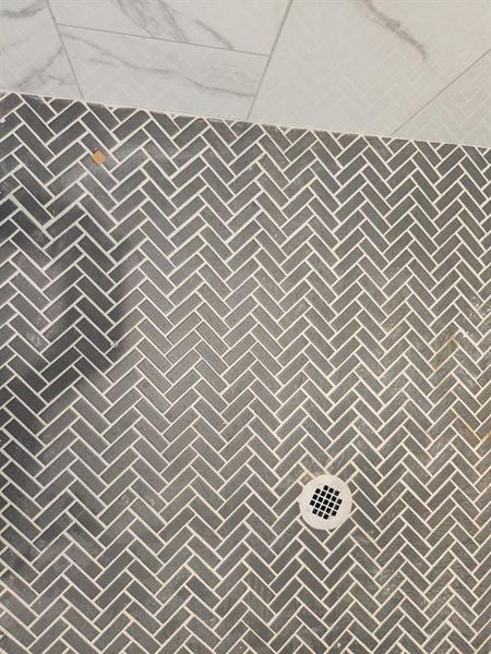 Full bath with a tile shower