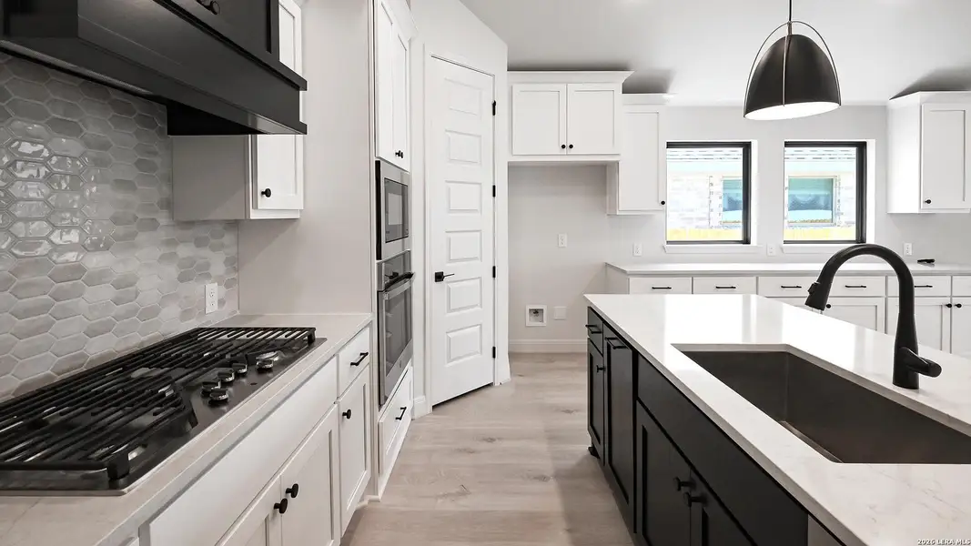 Furnished interior view inside a new home in Meadows of Mill Creek, Seguin (Image 6).