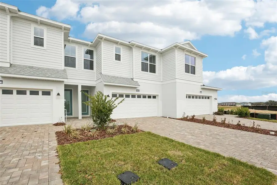 Front exterior of a new home in , San Antonio, FL, highlighting curb appeal (Image 24).