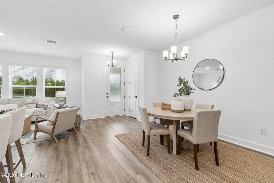 Furnished interior view inside a new home in Westerly Park at Wildlight - Courtyard Collection, Yulee (Image 8).