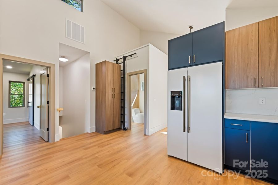 Open floorpan with main level well designed for modern life in the mountains